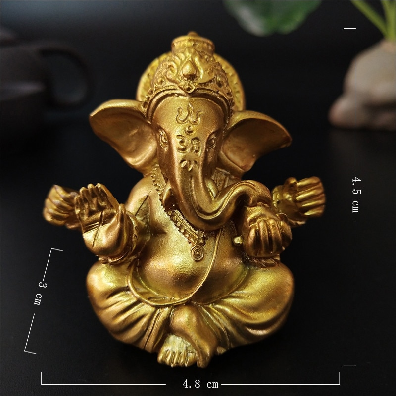 Zlatá buddhistická soška slona
